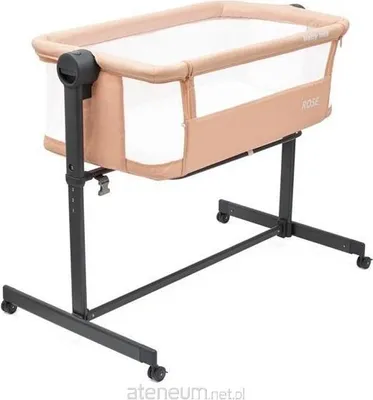 A baby crib on a stand with wheels.