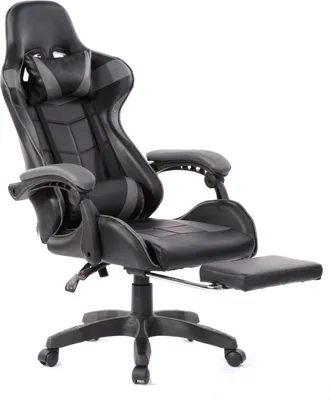 A black and gray gaming chair with a footrest, shown from a side-angle on a white background.