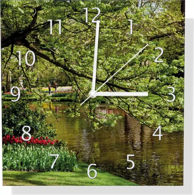 Produktbild von Wallario Design Wanduhr Bunte Blumen im Park am Wasser - Frühblüher am Ufer aus Aluverbund, Größe 30 x 30 cm