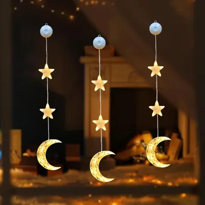 Image de Décoration lumineuse de Noël avec ventouses étoiles et LED lune
