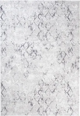 A close-up view of a rug with a diamond pattern.