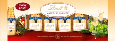 Zdjęcie produktu dla Czekolada Lindt Marc de Champagne w butelce 131 g