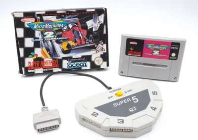 Produktbild von Micro Machines 2: Turbo Tournament + 4 Spieler Adapter