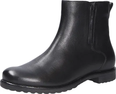 A black leather boot on a white background.