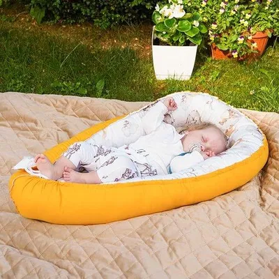 Produktbild von Babynesting in weicher Baumwollauflage - Reisebett für Säuglinge mit allergierendem Schutz.