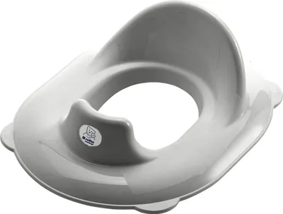 A gray baby toilet seat placed on a white background.