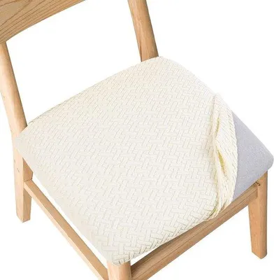 Zdjęcie produktu dla Zestaw pokrowców na krzesła do jadalni marki Unyqoos® – elastyczne i nadające się do prania, kolor kremowy, 95% poliester/5% spandex, z elastycznym brzegiem i regulowanymi paskami