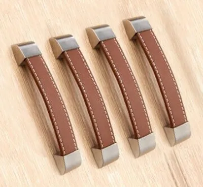 Produktbild von Set mit 4 Ledergriffe (96 mm, braun, Metallendstück)