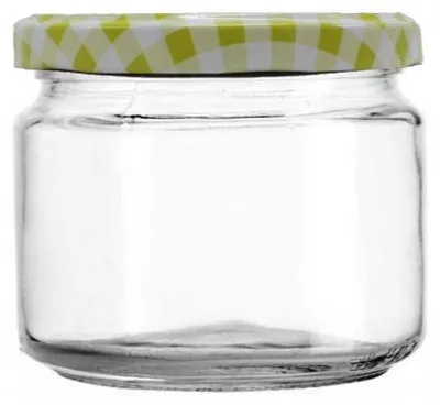 A clear glass jar with a checkered lid.