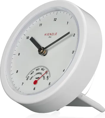 A white analog clock with a thermometer and hygrometer.