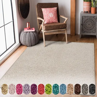 A shaggy cream rug is shown in a room with a chair, a pouf, and a cabinet. A row of color swatches is displayed below the rug.