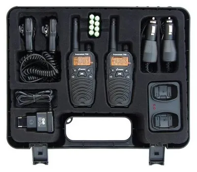 A black carrying case containing two walkie-talkies and various accessories.