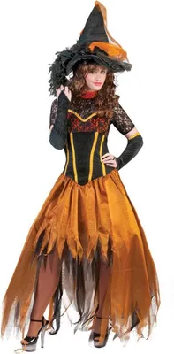 A woman wearing a witch costume.
