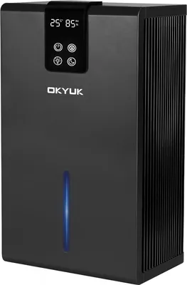 A black electric dehumidifier with a digital display and control buttons.