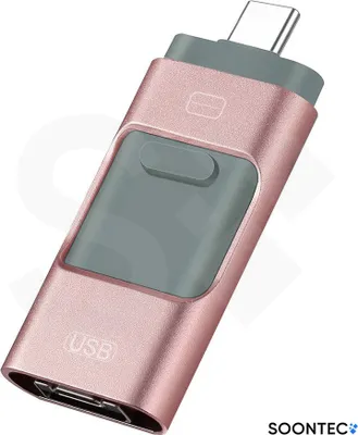 A rose gold USB flash drive with USB-C, USB, and Lightning connectors.