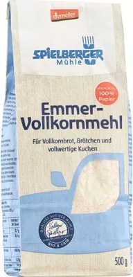 A bag of Spielberger Emmer-Vollkornmehl (whole grain emmer flour) with nutritional information and branding.