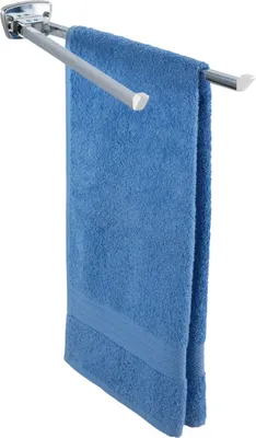 A blue towel hanging on a silver towel rack mounted on a wall.