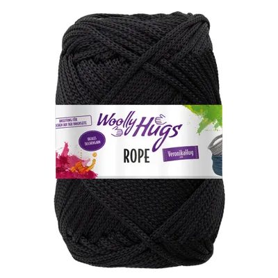 A ball of black yarn with a label.
