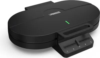 A black waffle maker is shown from a slightly elevated diagonal angle against a white background.