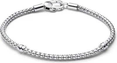 A silver Pandora bracelet with a textured chain and a clasp closure, presented on a white background.
