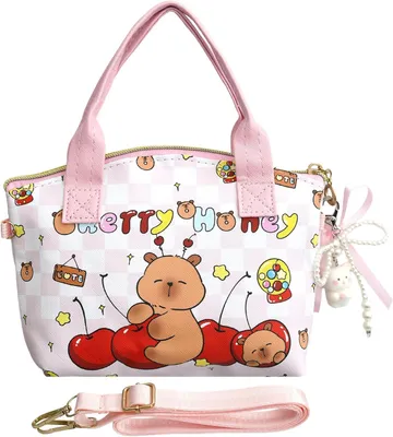 Produktbild von Kleine, stylische, pinkfarbene Kinderhandtasche aus Kunstleder mit Schlüsselring, ideal für Ausflüge und Reisen.