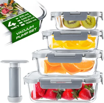 A set of glass vacuum food containers filled with fruit and a vacuum pump.