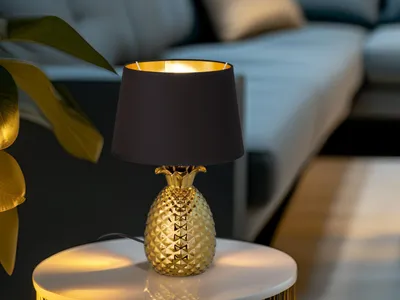 Produktbild von LED Tischleuchte Ananas aus Keramik mit Stofflampenschirm Ø28cm in Gold/Schwarz