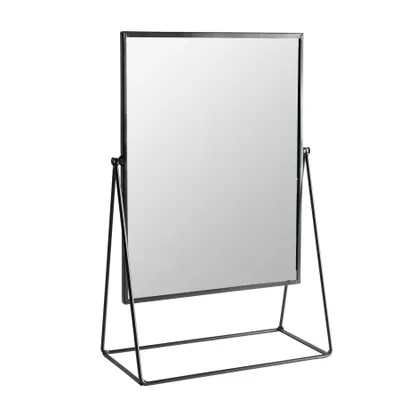 A black metal framed tabletop mirror on a white background.