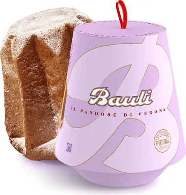 A traditional Italian Christmas cake (Pandoro) next to its packaging.