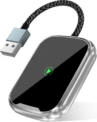 A close-up shot of a wireless adapter for a car, with a USB cable attached.