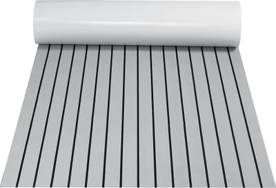 A roll of grey EVA foam flooring with black lines, designed for boats or yachts, is unrolled on a white surface.