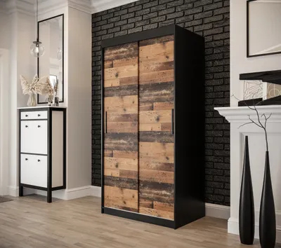A hallway with a wardrobe, shoe cabinet, and decorative elements.