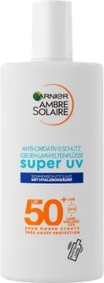 A white bottle of Garnier Ambre Solaire sunscreen with product information printed on it.
