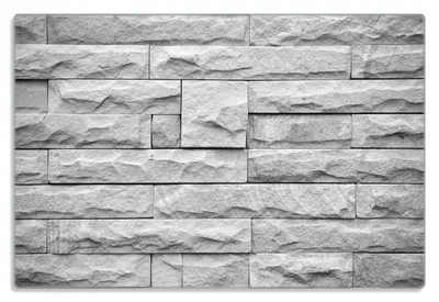Produktbild von Wallario Frühstücksbrettchen aus Glas 20 x 30 cm mit rutschfesten Füßen, Motiv Steinwand grau