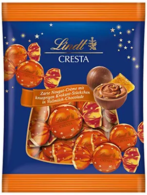 Produktbild von Lindt Cresta Kugeln aus Vollmilchschokolade und Krokant 101g 4er Pack