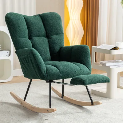A green teddy plush lounge chair with an ottoman, placed on a rug in a room with a lamp and side tables.