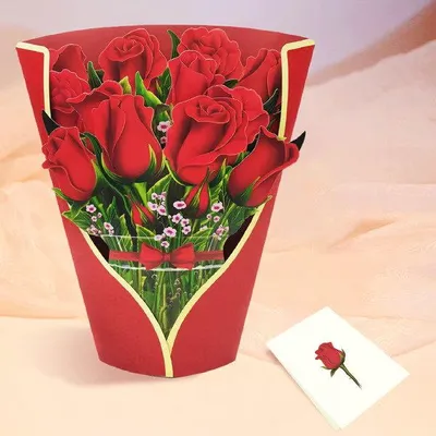Rote Pop-up-Grußkarte in Form eines Straußes roter Rosen, mit einer kleinen weißen Karte mit einer einzelnen roten Rose