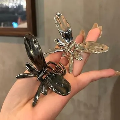 Produktbild von 2 Schmetterlings-Haarspangen aus Metall, matte, dünne Haarspangen für Damen