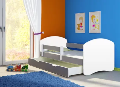A child's bed with a pull-out drawer in a room with blue and orange walls.