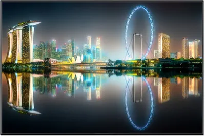 Produktbild von Wallario Wandbild Singapur bei Nacht, Größe: 61 x 91,50 cm, Poster mit schwarzem Aluminiumrahmen