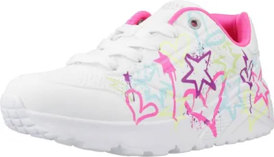 A white sneaker with colorful graffiti-style graphics.