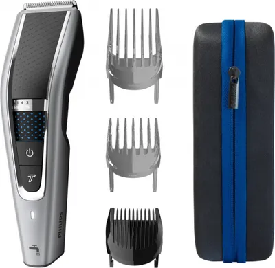 A Philips hair clipper with accessories and a storage case, displayed against a white background.