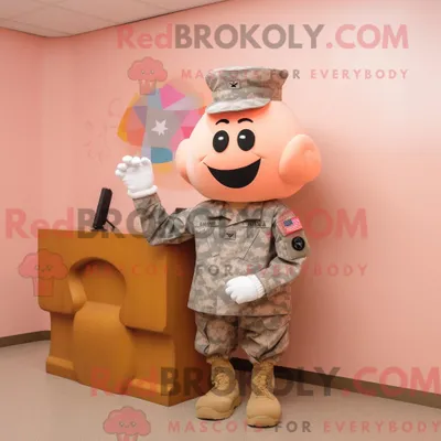 Obrázok produktu pre Postava maskota REDBROKOLY, amerického vojaka v uniforme broskyňovej farby, oblečeného v kardigane a s vlasovými sponkami