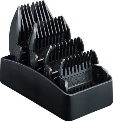 A black plastic stand holding several black hair clipper attachments of varying sizes.
