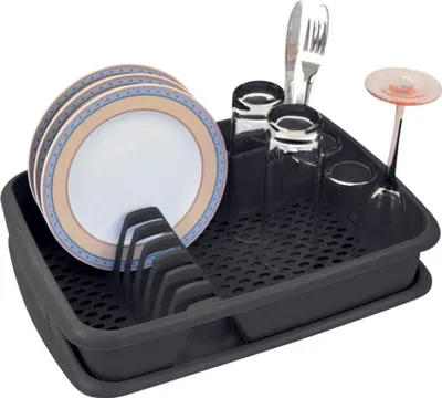 A black dish rack filled with dishes, glasses, and cutlery.