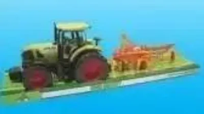 Image de Tracteur avec machines agricoles