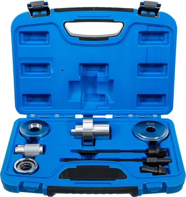 A blue plastic case containing a set of tools, specifically a silent bearing tool set for a VW Polo 9N.