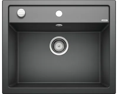 A top-down view of a dark gray kitchen sink with a silver drain and faucet accessories.