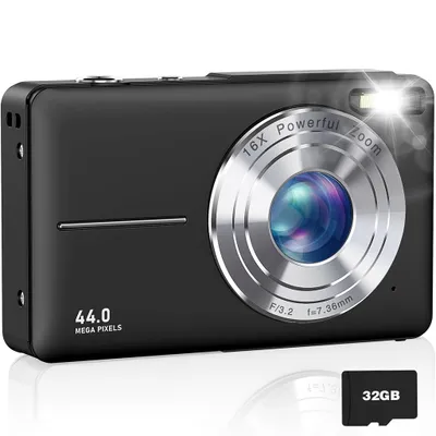 A black digital camera is shown on a white background, with a 32GB memory card next to it.