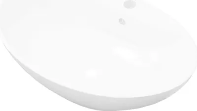 A white ceramic sink on a white background.